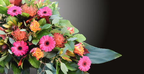 Flower arrangement isolated on black background.