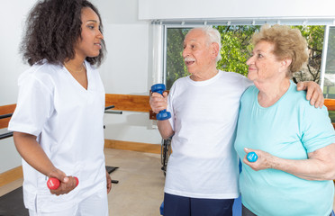 Fototapeta premium Nurse with elderly people