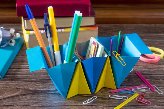 Children's office organizer made of paper handmade. Project of children's creativity, handicrafts, crafts for children.