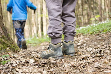 Children in forest, hiking shoes