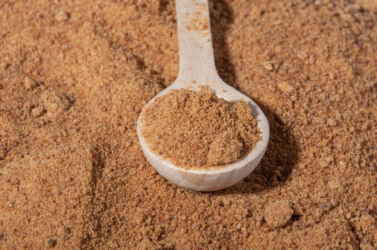 Sugar cane close up - measuring tablespoon 