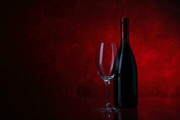 Wineglass and bottle of red wine