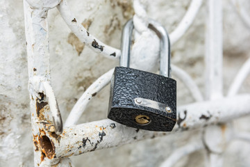 Hanging metal padlock