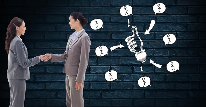 Businesswoman shaking hands by idea icons