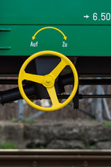 Burgas, Bulgaria - March 20, 2017 - Freight cargo train Detail - 4axled box wagon green Type:Eanos...
