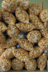 Close Up View of Bags of Popcorn/Kettlecorn Stacked Up on Each Other, Vertical - Daytime (HDR Image)
