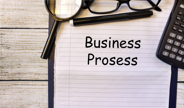 Clipboard with text written on paper - BUSINESS CONCEPT