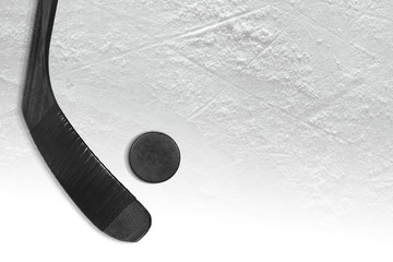 Hockey puck and putter on ice