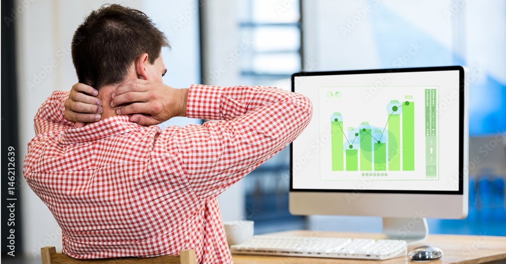 Poster rear view of stressed businessman looking at graph on computer