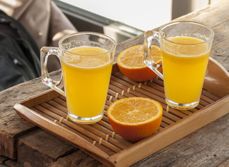 orange juice wooden background