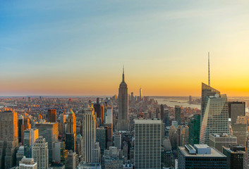 New York City skyline with urban skyscrapers at sunset