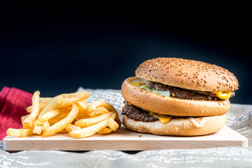Cheese burger - American cheese burger with Golden French fries