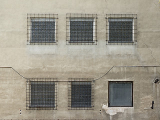 Factory building with water reservoir. Daylight, cloudy sky, the site of chemists from the 70s to 90s. Chemical industry for pharmaceuticals and antibiotics.