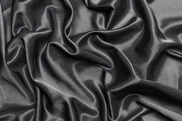 Fototapeta premium Black silk fabric background