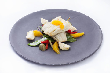 Cod fillet with vegetables and orange pulp