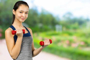 woman with a dumbbell