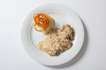 stewed chicken with white mashed potato and mashroom sauce