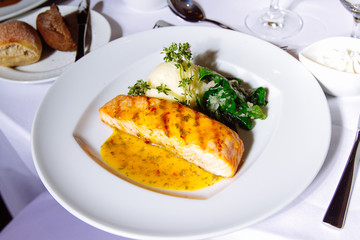 Grilled Salmon Steak with Spinach,Mash potato, souse