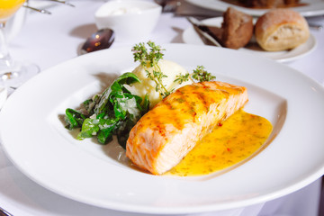 Grilled Salmon Steak with Spinach,Mash potato, souse