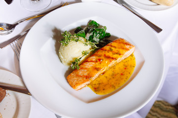 Grilled Salmon Steak with Spinach,Mash potato, souse