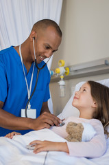 Nurse examining girl