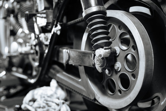 Picture of dissembled bike in mechanics workshop