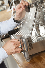 barista steaming milk
