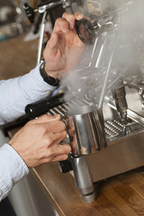 barista steaming milk
