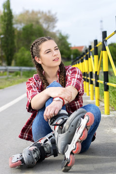 Teenager with rollerblades