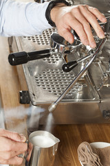 barista steaming milk