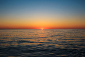 Beautiful sunset on the lake shore