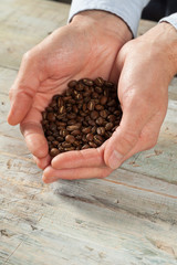 Coffee beans in the hands