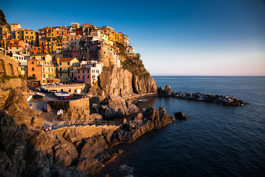 travel amazing Italy series - village of Manarola, Liguaria on the Cinque Terre coast at sunset