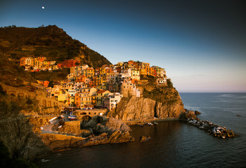 Fototapeta na wymiar travel amazing Italy series - village of Manarola, Liguaria on the Cinque Terre coast at sunset