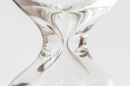 Close up body shape of hourglass or sandglass on white background.