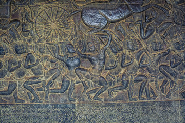 Carved stone relief at Angkor Wat, Cambodia