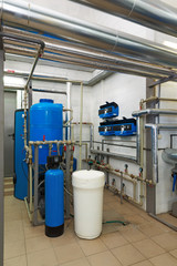 Modern water treatment system with automatic control units in industrial gas boiler house
