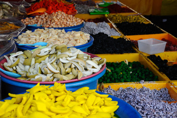 Dried fruits sold in flea. Partially coated with a salt or sugar in the drying process to prolong...