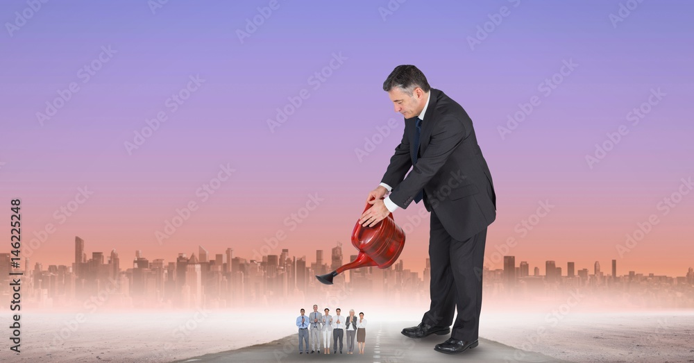 Wall mural Digital composite image of manager watering employees