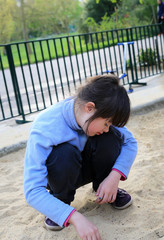 Little girl have fun in the park