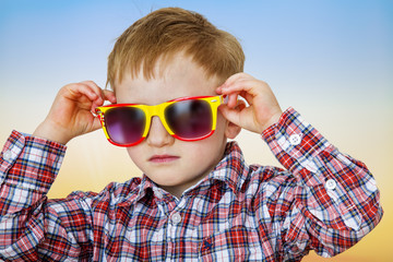 Boy with sunglasses