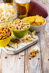 Beer snacks on wooden table