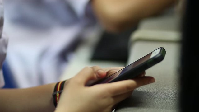 teenagers people using Social media on touch screen pad in smartphone for chat or searching for e-learning education of technology