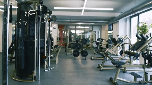Gym with various exercise machines in it