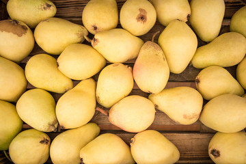 Juice yellow pears background.