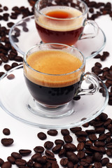 Coffee cup and beans on a white background.