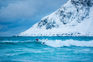 Training surfers in cold waters of Lofotens