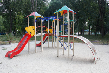 Empty playground in the yard of the house