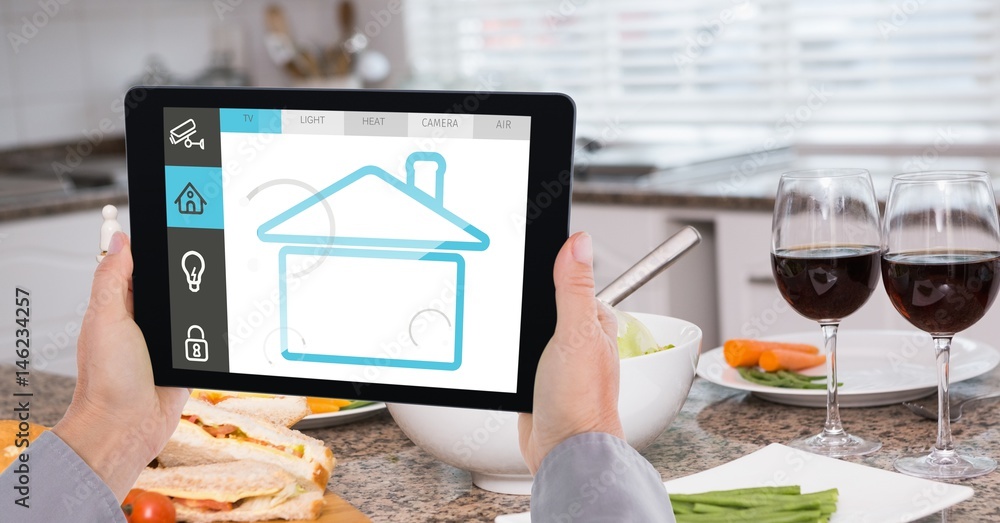 Sticker Hands using smart home app on digital tablet