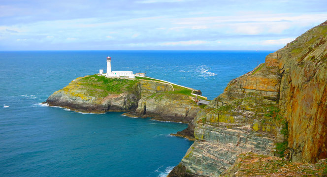 The South Stack Lighthouse - built on the summit of a small island off the north-west coast of Holy Island, Anglesey, Wales. Historically built in 1809 to warn ships of the dangerous rocks below.